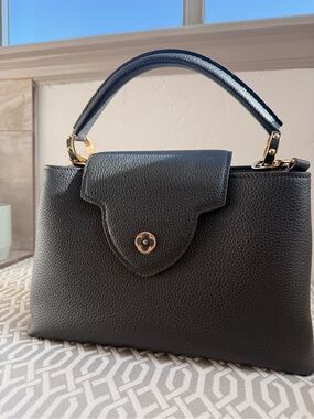 LV Black leather purse with hot pink inside